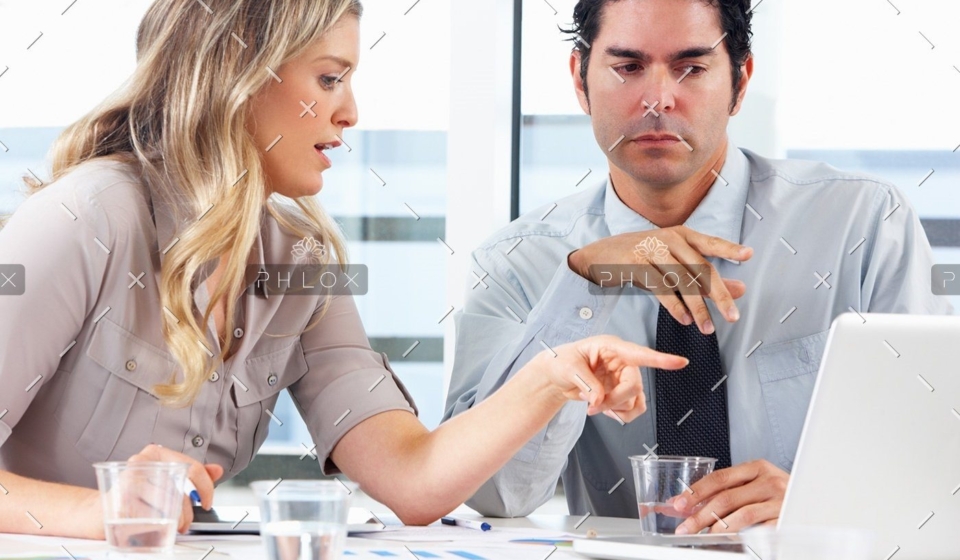 demo-attachment-1152-businessman-and-businesswoman-meeting-in-office-PZZXTMB