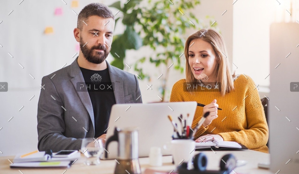 demo-attachment-1150-two-business-people-with-wheelchair-in-the-office-P7XLSBC
