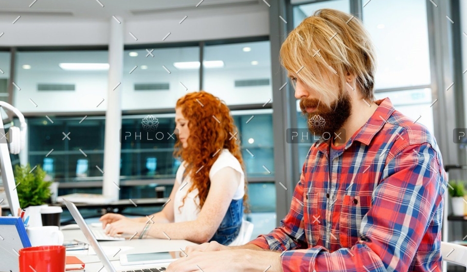 demo-attachment-1149-two-co-workers-working-together-PPVW2LA